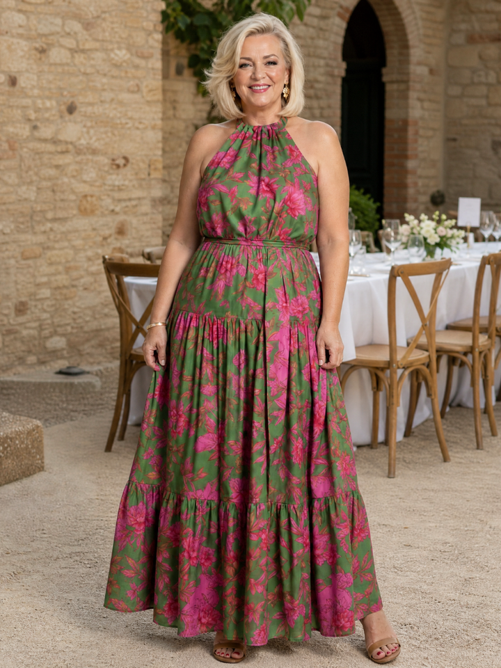 Elegante rozenkleurige midi jurk met halterdecolleté