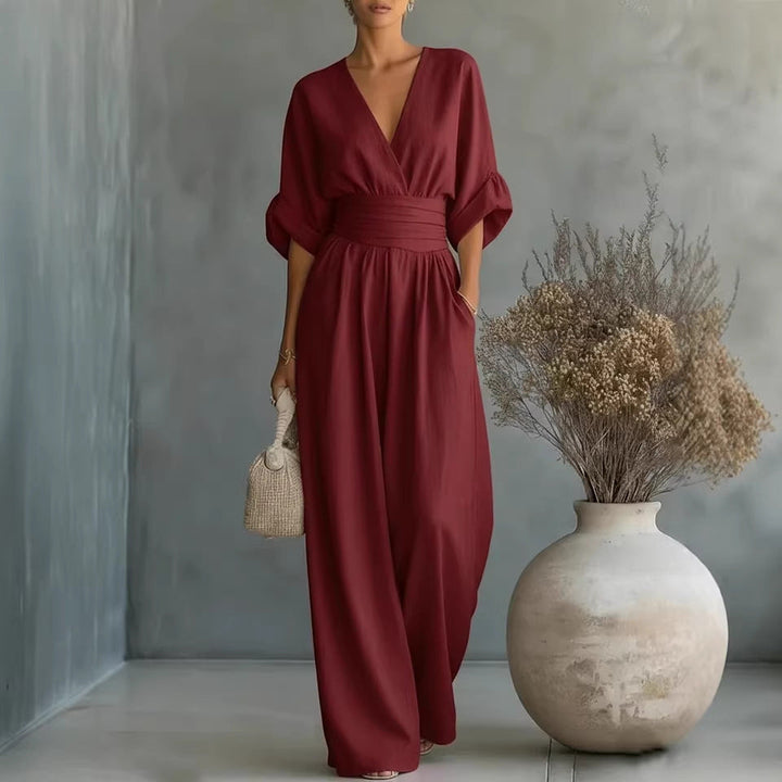 Elegante V-hals Jurk, Met Ontblote Rug en Vloeiende Mouwen - Maison Claire et Sylvie