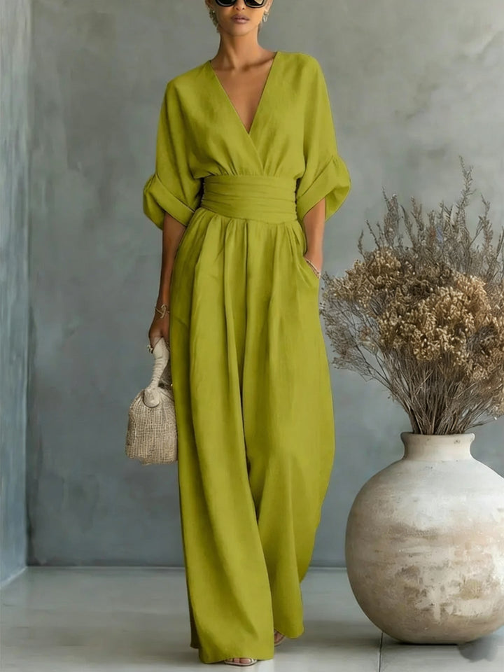 Elegante V-hals Jurk, Met Ontblote Rug en Vloeiende Mouwen - Maison Claire et Sylvie