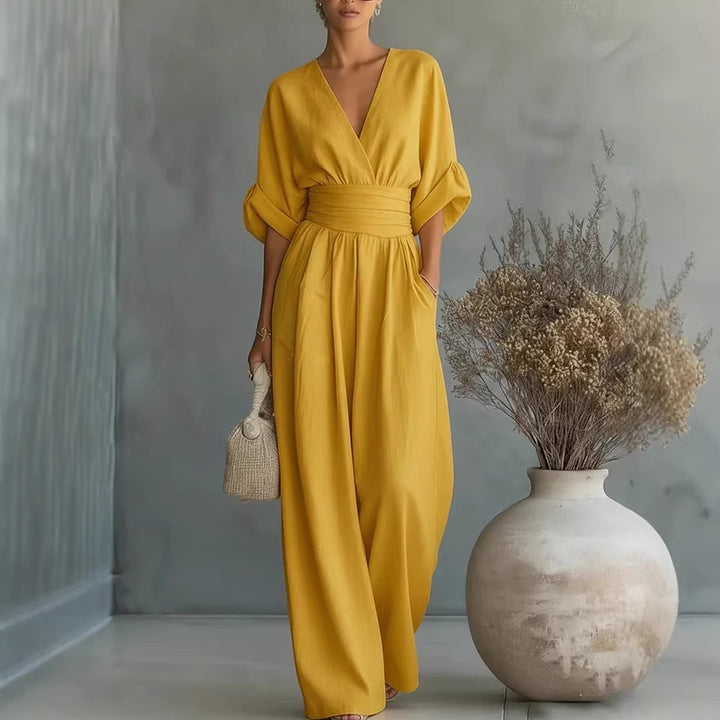 Elegante V-hals Jurk, Met Ontblote Rug en Vloeiende Mouwen - Maison Claire et Sylvie