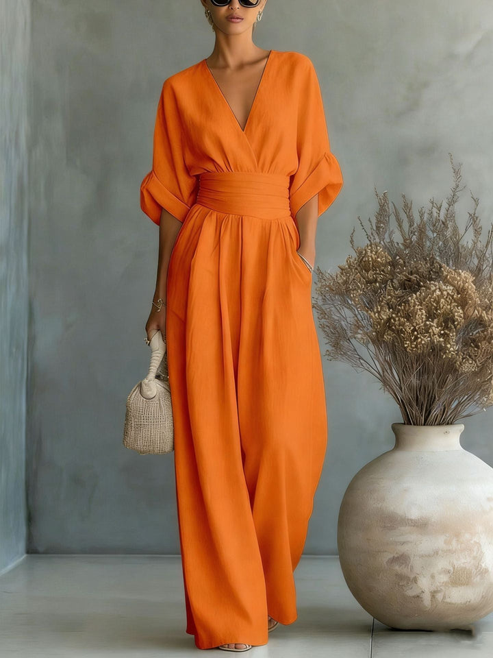 Elegante V-hals Jurk, Met Ontblote Rug en Vloeiende Mouwen - Maison Claire et Sylvie