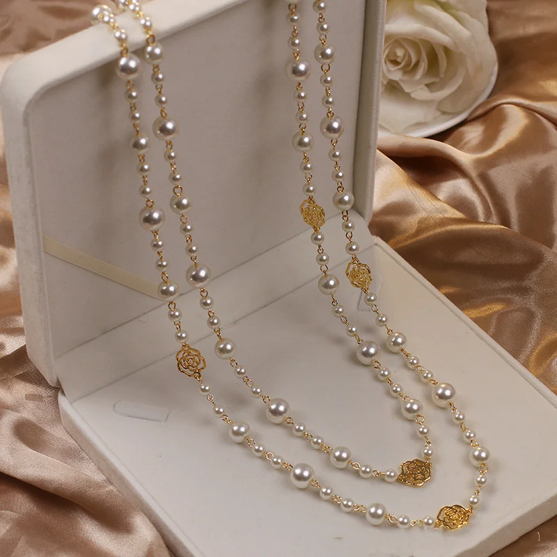 Elegante gouden ketting met parels