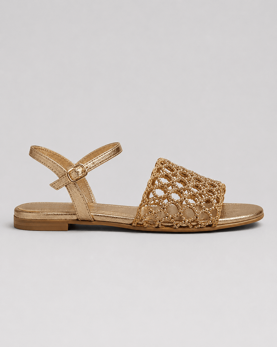 Aurora | Gouden sandalen: de charme van de zomer